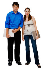 Fototapeta premium Portrait of couple holding laptops