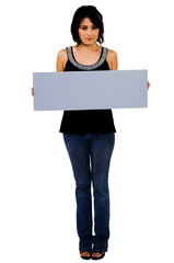 Latin American woman showing placard