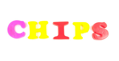 chips written with fridge magnets on white background