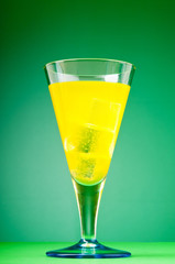 Colourful cocktail in glasses with ice