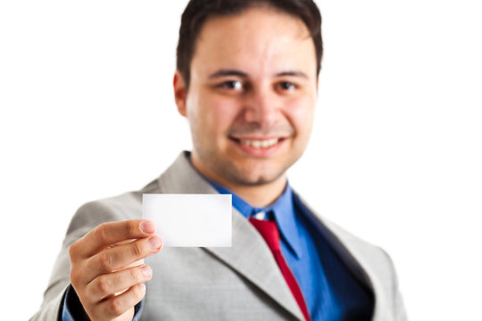 Empty business card in a businessman hand