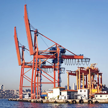 Commercial harbor with large industrial cranes