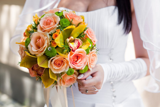 Bride with bouquet, closeup