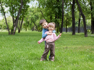 Fototapeta premium happy sister and brother outdoors