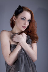 Naklejka premium Beautiful red-haired girl