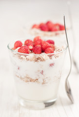 Yogurt with muesli and strawberries