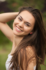 Fototapeta premium Closeup portrait of a happy young woman