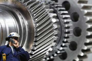 steel worker and gear machinery