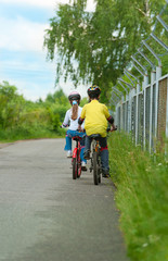 Obraz premium Walk on bicycles