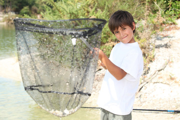 Boy with a huge fishing net