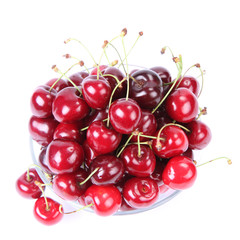 Obraz na płótnie Canvas Bowl of Cherry fruits on a white background