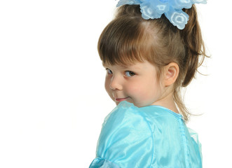 Pretty the little girl in a blue dress