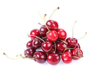 Obraz na płótnie Canvas Pile of cherry fruits on a white background