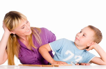 family drawing at table