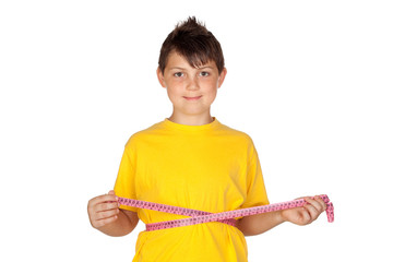 Funny child with yellow t-shirt with a tape measure