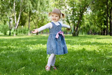 Portrait of a little girl outdoors