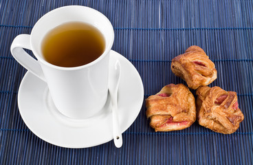 Tea and biscuits puff pastry with raspberries