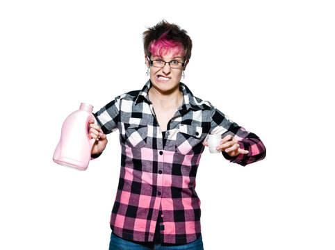 Angry woman holding detergent