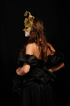 sexy woman in golden party mask
