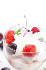 ice cream, cherries, raspberries and strawberries isolated on wh