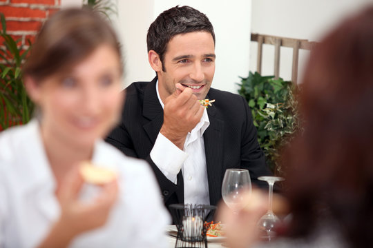 Man eating a meal in a restaurant
