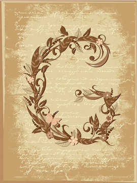 Floral letter on paper grunge