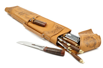 quiver with set of skewers for barbecue on white background