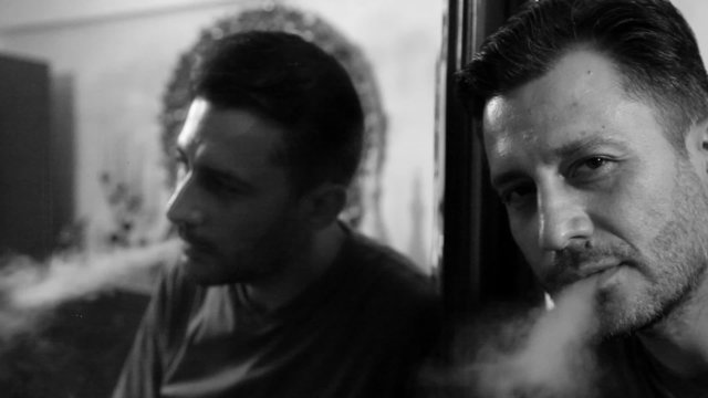 man smoking cigarette 3, shooting Canon 5D MarkII