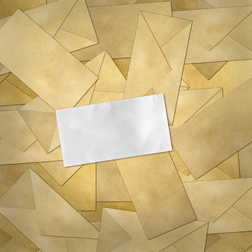 paper on Brown Vintage Envelope background .
