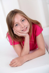 Fototapeta premium Portrait of smiling blond girl