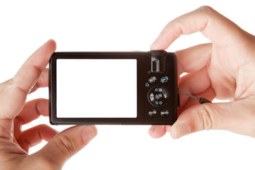Hands holding digital photo camera, copy space for your image