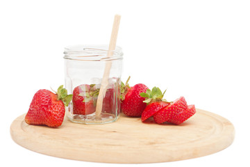 strawberries on a board isolated on white