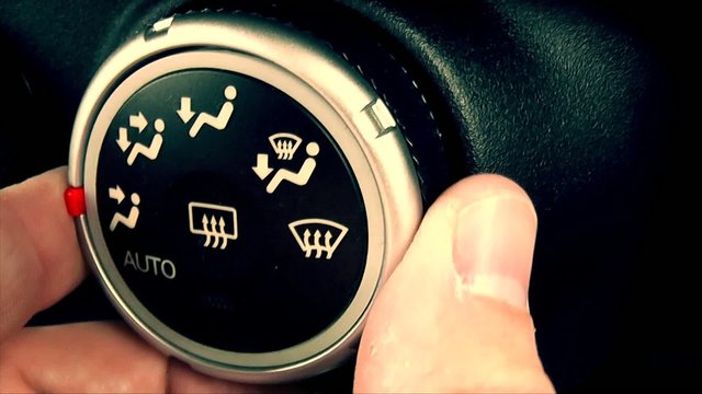 Bouton de climatisation automobile