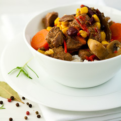 Beef with vegetables, mushrooms and rice
