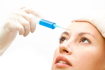 young women injecting with botox