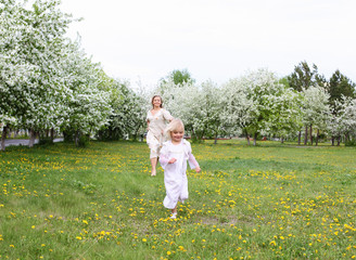 Fototapeta premium girl with mother in the park