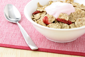 delicious strawberry yogurt and fresh cereal