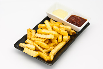 French fries in black plate