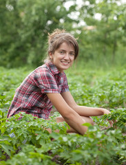 Girl working  in field