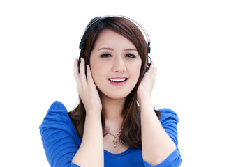 Beautiful young woman listening to music