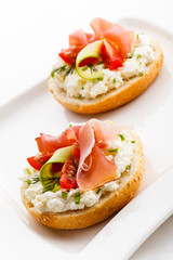 Breadroll with cream cheese and smoked bacon