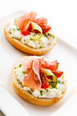 Breadroll with cream cheese and smoked bacon