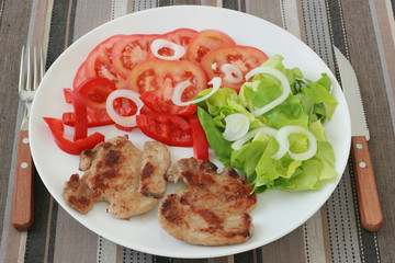 Fried pork with salad