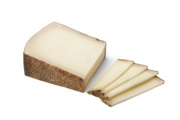 Piece of Swiss Gruyere cheese ans slices