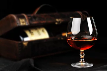 Fototapete Alkohol glass of cognac