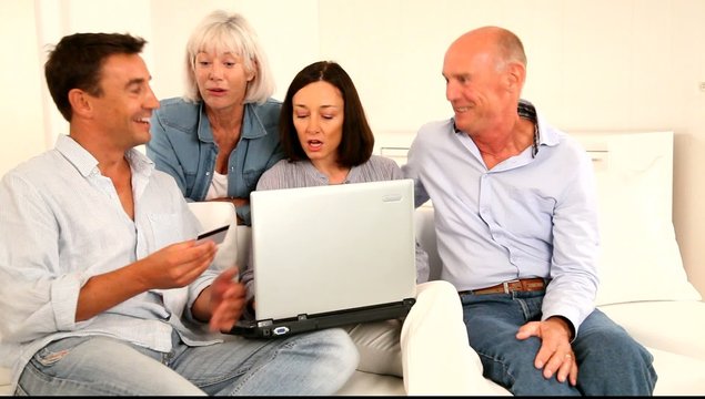 Senior people with couple doing shopping online