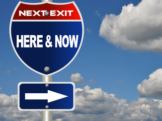 Here and now road sign