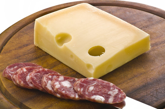 Hot salami with cheese on wood