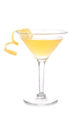 Yellow banana cocktail in martini glass with lemon twist