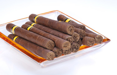 Cigars in a glass plate